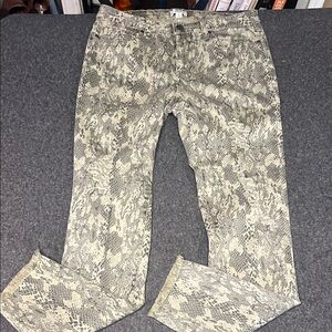 women's "Easel" brand snake print jeans in size large.